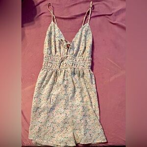 Super cute romper mini or dress if you may like.